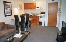 kitchen lounge and dining area of 2-bedroom suite